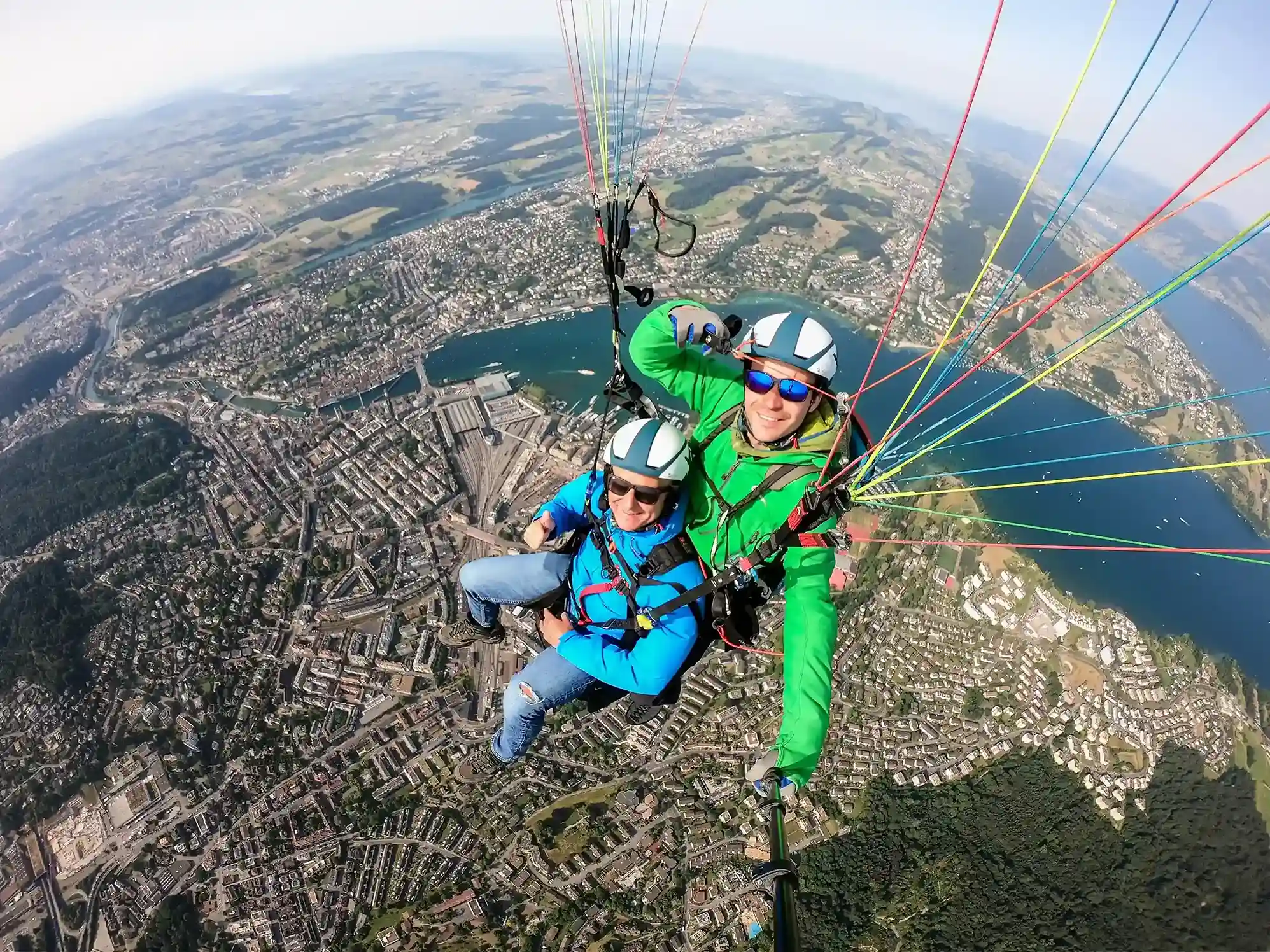 Tandem paragliding above Lucerne and Lake Lucerne with wide panoramic view